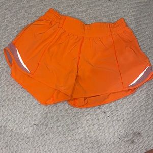 ORANGE LULULEMON HOTTY HOT SHORTS!